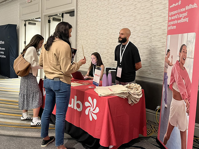CONNECT Exhibitor People at an exhibitor booth
