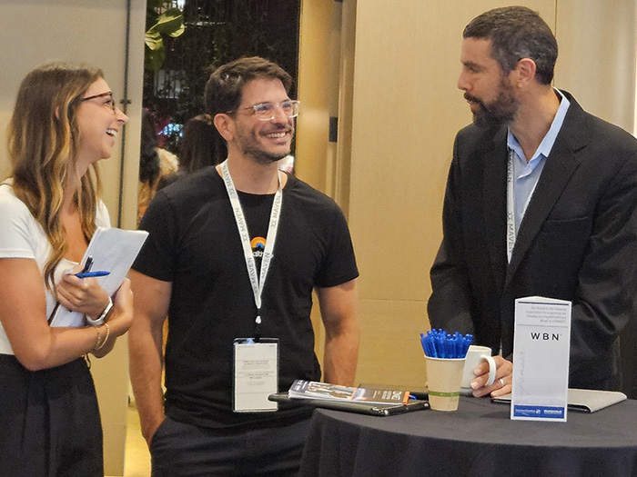 CONNECT Sponsor Two people talking with a sponsor