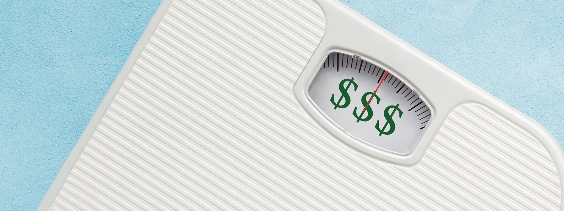 Weight scale showing money signs