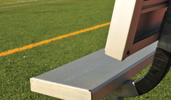 Close up of bench on a game field sideline