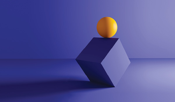 A ball balancing on the edge of a tilted cube