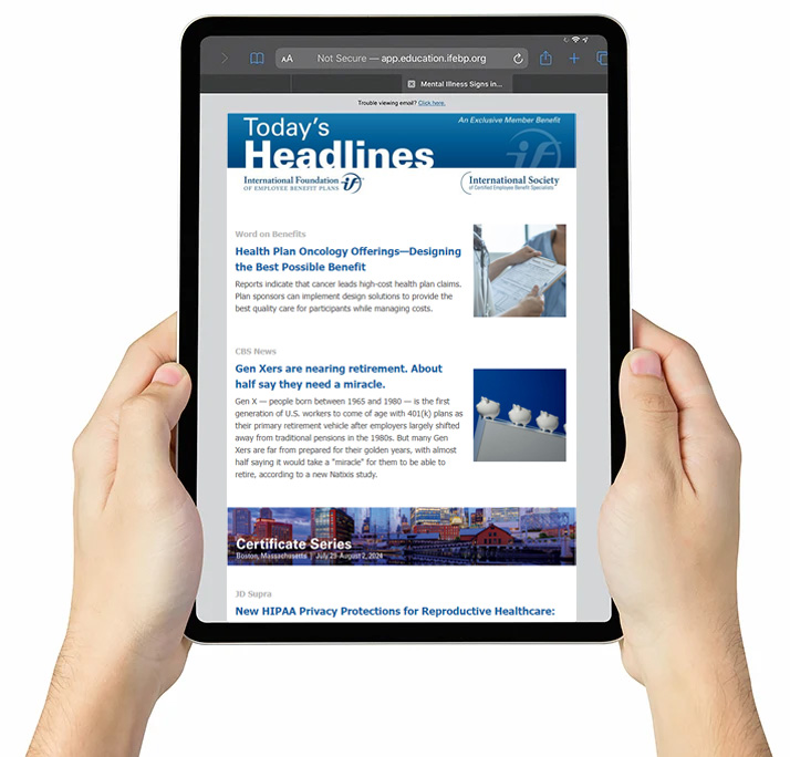Today's Headlines Hands holding tablet displaying Today's Headlines